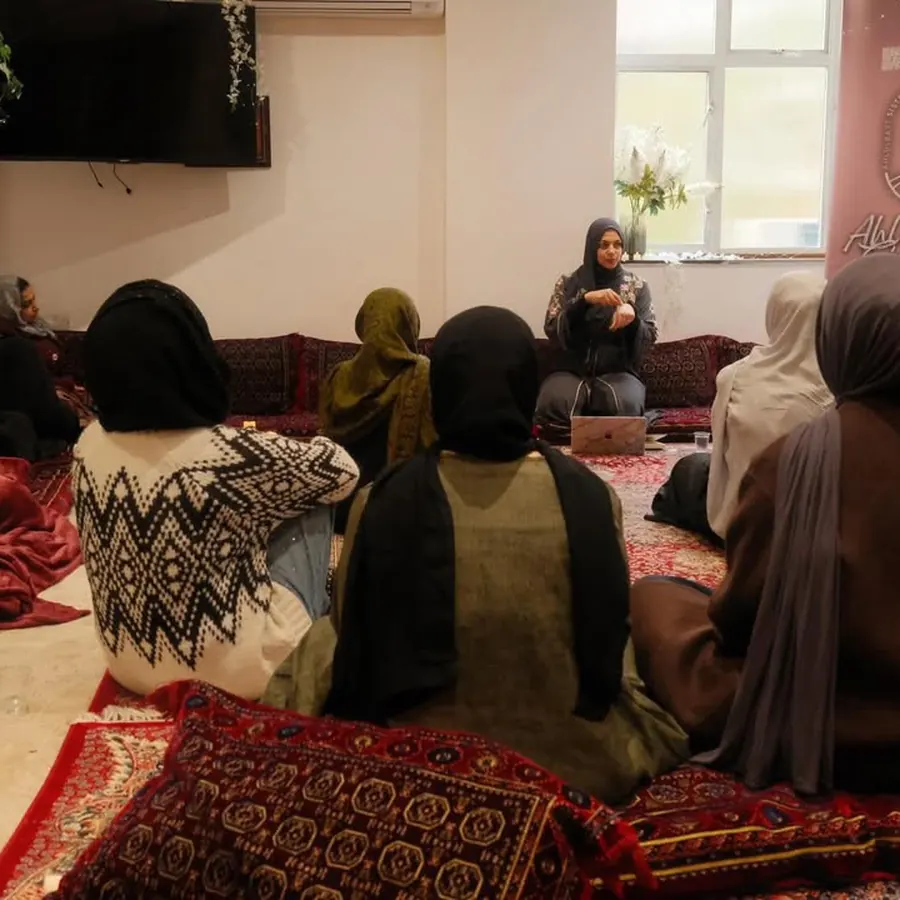 A circle of sisters at an evening session